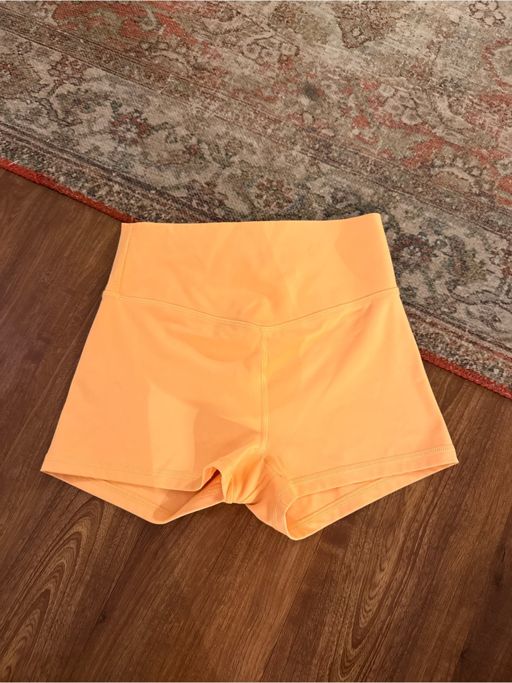 Fabletics High-Waist Shorts in Bright Orange